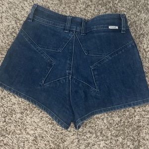 Super cheeky wrangler high waisted shorts with star detail
